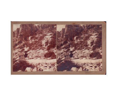 Stereoscope photos on board; a couple traveling through a rocky terrain in a horse drawn buggy. Board size: 7in x 4in. Sight 