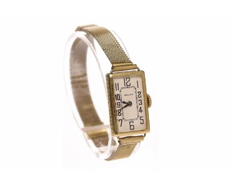 LADY'S ROLEX ART DECO EIGHTEEN CARAT GOLD MANUAL WIND WRIST WATCHsigned 15 jewel movement, the rectangular dial with Arabic n