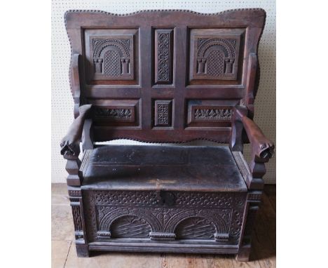 A Victorian Carved Oak Monk's Bench, top 108 x 75 cm