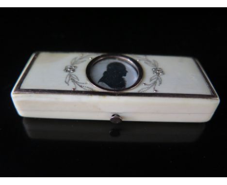 A Georgian Ivory and Yellow Metal Mounted Patch Box with central glazed reserve containing a miniature silhouette by John Mie