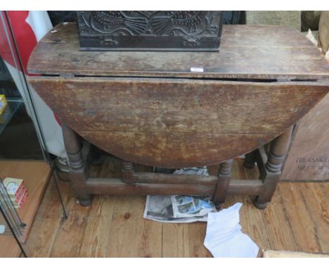 An Eighteenth Century Oak Gate Leg Table