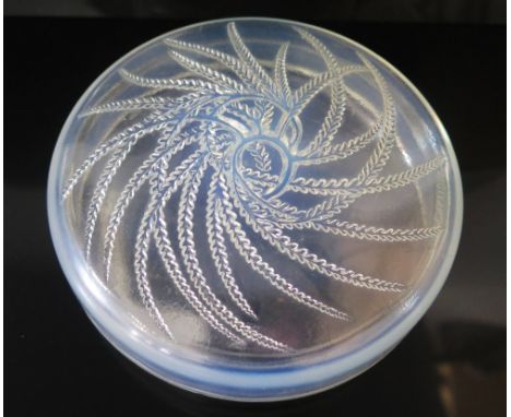 R. Lalique - A Quatre Flacons Powder Box, c. 14 cm diam, moulded mark to cover