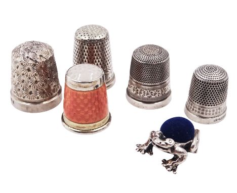 Silver orange guilloche enamel thimble, stamped 935 Sterling Silver, together with four other silver thimbles, all hallmarked