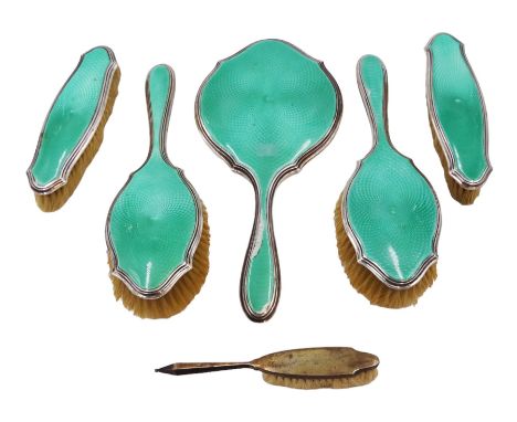 Art Deco five piece green guilloche enamel silver dressing table set, comprising hand mirror, two hair brushes and two clothe