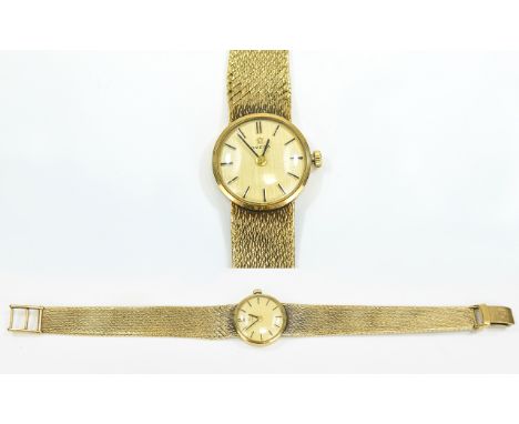 Ladies 9ct Gold Omega Wristwatch Circular Champagne Dial Baton Numerals, Manual Wind, Case Numbered 7115527, Movement Numbere
