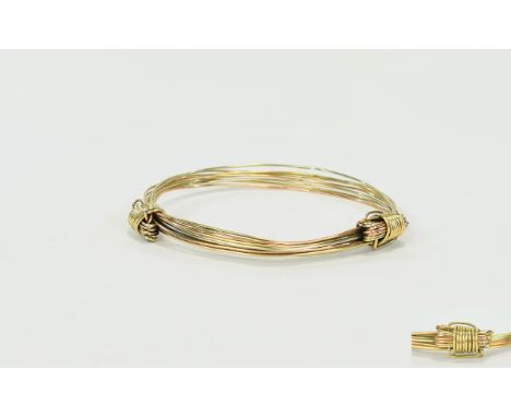A 9ct Gold Elephant Hair Bracelet / Bangle. Fully Hallmarked for 375 - 9ct Gold. 13.8 grams. 