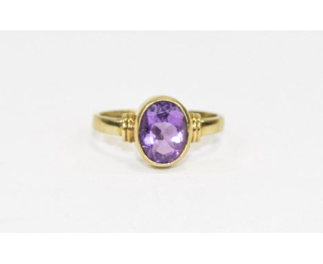 Ladies 9ct Gold Set Single Stone Oval Shaped Faceted Amethyst Ring the amethyst of excellent colour. Est weight 4ts. Fully ha