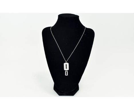 Swarovski Statement Pendant Long dogtag style pendant with additional rectangular drop on fine silver tone chain. Set with mu