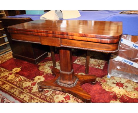 An early Victorian mahogany fold-over top card table, on faceted column and quadraform base, 36" wide