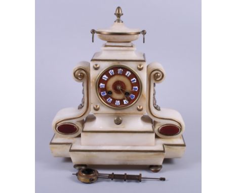 A late 19th century white marble and brass mounted mantel clock with urn finial and blue and white enamelled Roman numerals, 