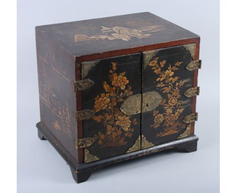 A collector's 19th century Japanese lacquered cabinet, fitted drawers, on bracket feet, 11" wide