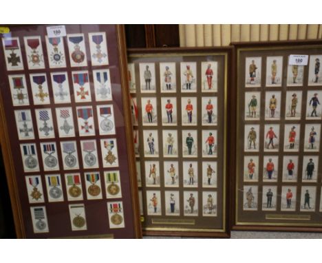 A set of Players cigarette cards, "Empire Uniforms 1983", framed and glazed, a similar set, war decorations, framed and glaze