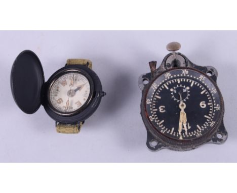 A WWII Luftwaffe cockpit clock, stamped Borduhr 840085, and a military wrist compass