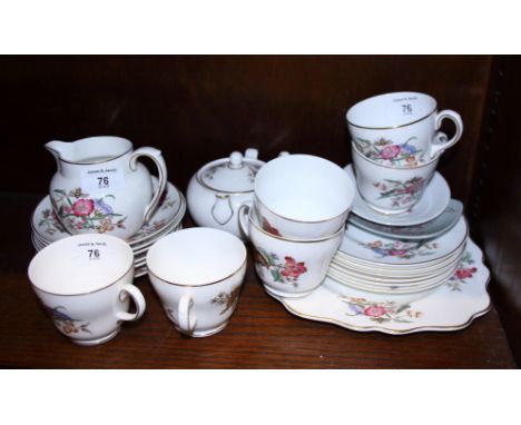 A Wedgwood bone china teaset, painted with insects and floral sprays, and a complete set of limited edition Hornsea Christmas