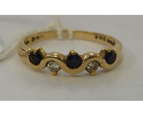 A 9ct gold three stone sapphire and two stone sapphire ring       11