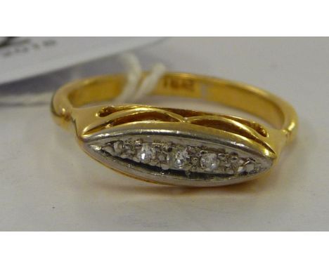 An 18ct gold ring, set with five small in-line diamonds       11