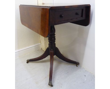 A Regency rosewood pedestal Pembroke table, the top with a crossbanded border and round corners, over an end drawer and facsi
