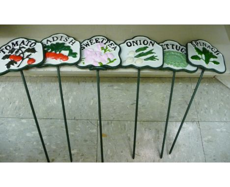 A set of six cast iron vegetable patch markers       OS6