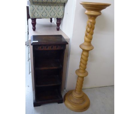 A mid 20thC dark stained oak, three tier open front bookcase, raised on a bracket plinth  28''h  11''w; and a modern light co