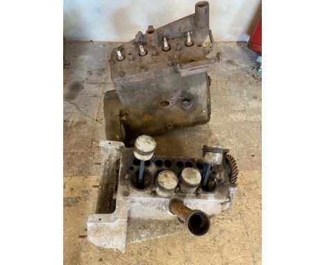 An Austin 7 crankcase and a Morris 8 engine.
