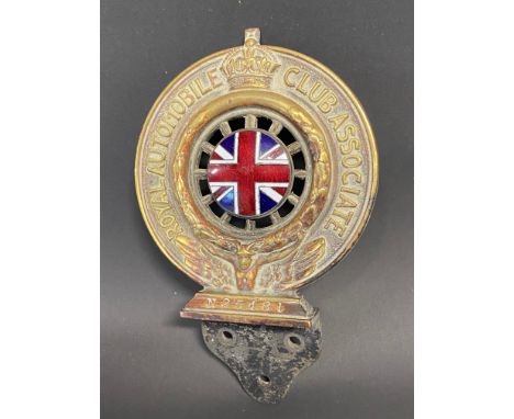 An RAC Associate member's badge with union jack enamel centre, no. N25481.