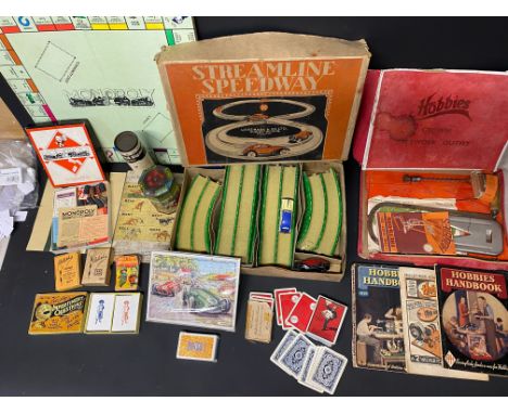 A boxed Streamline Speedway game by Louis Marx &amp; Co. a motoring related puzzle, a group of WH Smith playing cards etc.