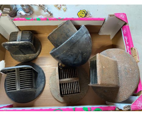A box of war time headlamp covers.