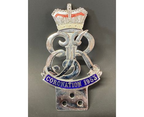 A 1953 Coronation chrome plated and enamel car badge in good condition.