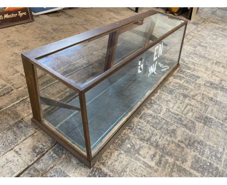 A counter top display cabinet with enamel letters to the front advertising Greens Ink, 46 1/2" w x 14 1/2" h x 15" d.