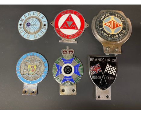 A selection of car badges including Motor Cycle Unity Light Car Club, Brands Hatch Motor Club etc.