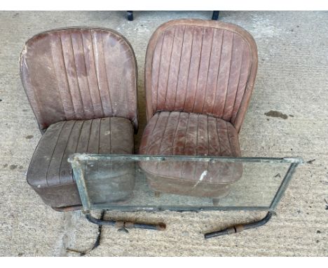 A nickel plated auster rear screen, two 1930s front seats and a large trunk.