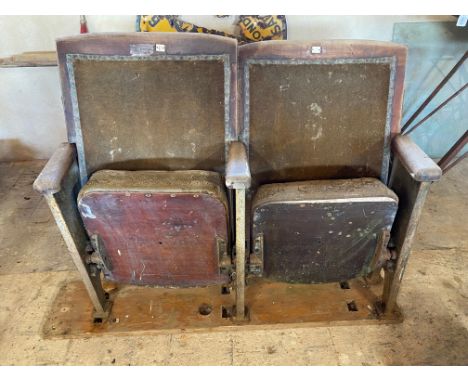 A pair of Art Deco cinema seats.