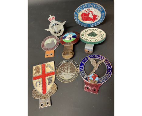 A selection of assorted car badges including Dominion Automobile Association, Royal Air Forces Association etc.