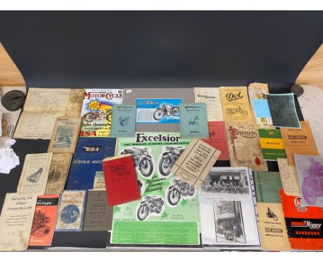 A selection of motorcycle literature including a Royal Enfield Model G list of spare parts, April 1st 1938, a DOT 250 side va