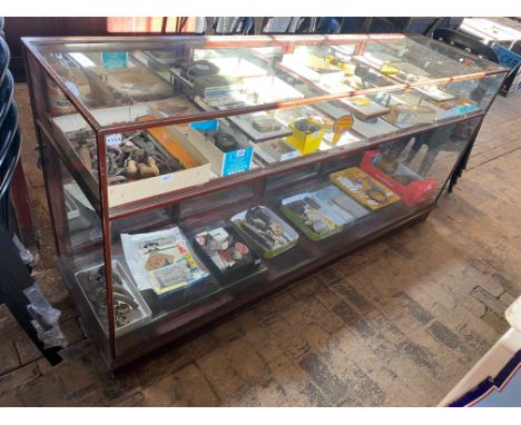 A large Victorian/Edwardian mahogany framed shop counter display cabinet, unusually having a high shelf, 84" w x 40" h x 23" 