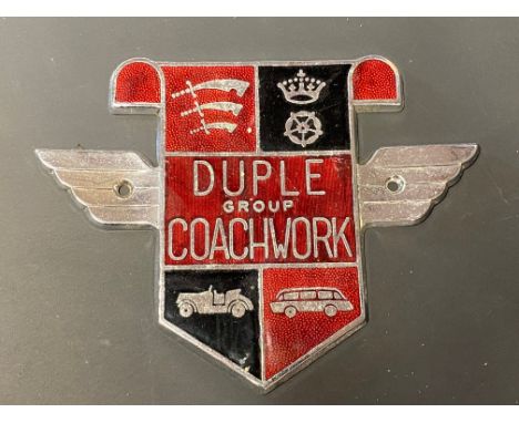 A Duple Group Coachwork chrome plated and enamel badge.