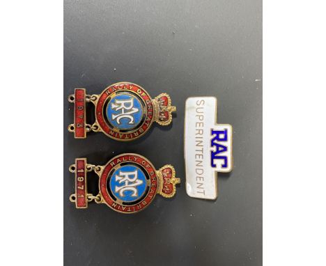 An RAC Superintendent enamel cap badge and two RAC Rally of Great Britain enamel badges with dated bars attached.