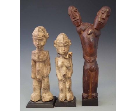 Pair of Lobi figures, also a double headed figure, the tallest piece measures 29cm high     All lots in this Tribal and Afric