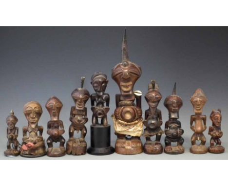 Ten Songye Nkisi figures, the tallest measures 34cm high     All lots in this Tribal and African Art Sale are sold subject to