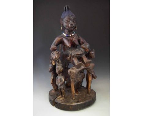 Large Yoruba Maternity female figure group, 80cm high All lots in this Tribal and African Art Sale are sold subject to V.A.T.