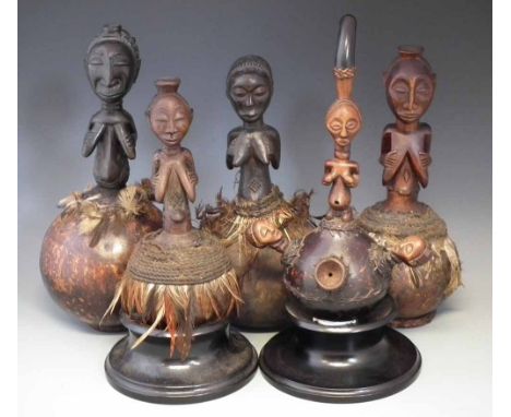 Five Luba / Hemba Calabash figures, the tallest measures 35cm high     All lots in this Tribal and African Art Sale are sold 