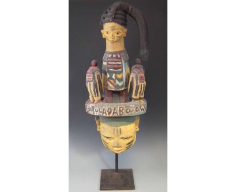 Yoruba Egungun headdress, 72cm high     All lots in this Tribal and African Art Sale are sold subject to V.A.T. Therefore £10