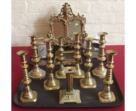 Three pairs of brass candlesticks, brass pendant light with glass panels, gilt metal picture frame and carriage clock etc. Co