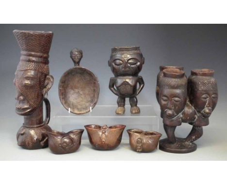 Collection of vessels, including three double spouted ceremonial cups probably Suku, a Kuba figural cup and similar three hea