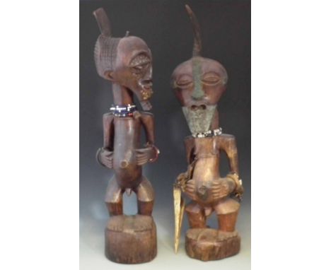 Two large Songye Nkisi or power figures, the tallest measures 94cm high.     All lots in this Tribal and African Art Sale are