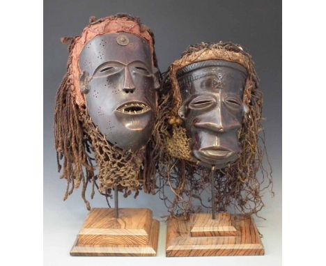 Two Chokwe masks, the largest measures 27cm high excluding base.     All lots in this Tribal and African Art Sale are sold su