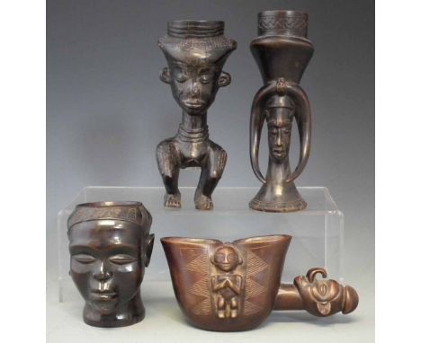 Kuba anthropomorphic janus cup, together with a Yaka palm wine cup and two other figural cups, the tallest measures 20cm high