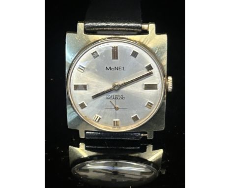 A vintage McNeil watch currently ticking 
