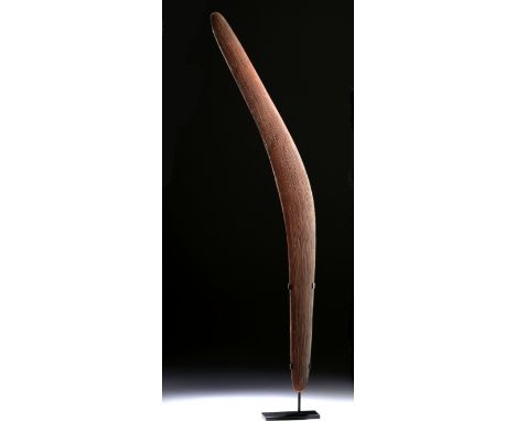 Oceania, Australia, Aboriginal peoples, ca. late 19th to early 20th century CE. A gorgeous, hand-carved wooden boomerang mean