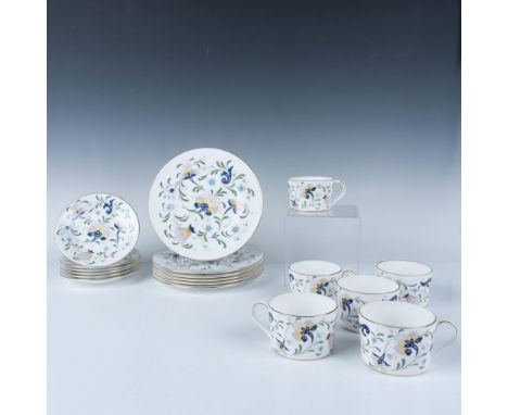 Beautiful pieces featuring a floral design with gilt accents. Coalport backstamps. The saucers measure 5.75"dia. The cups mea